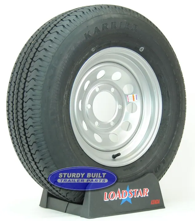 ST225/75R15 Radial Trailer Tire on a Silver Gray Mod 6 bolt Wheel