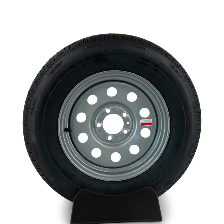 Rainier ST205/75R15 Radial Trailer Tire on a 5 Bolt Silver Modular Painted Wheel
